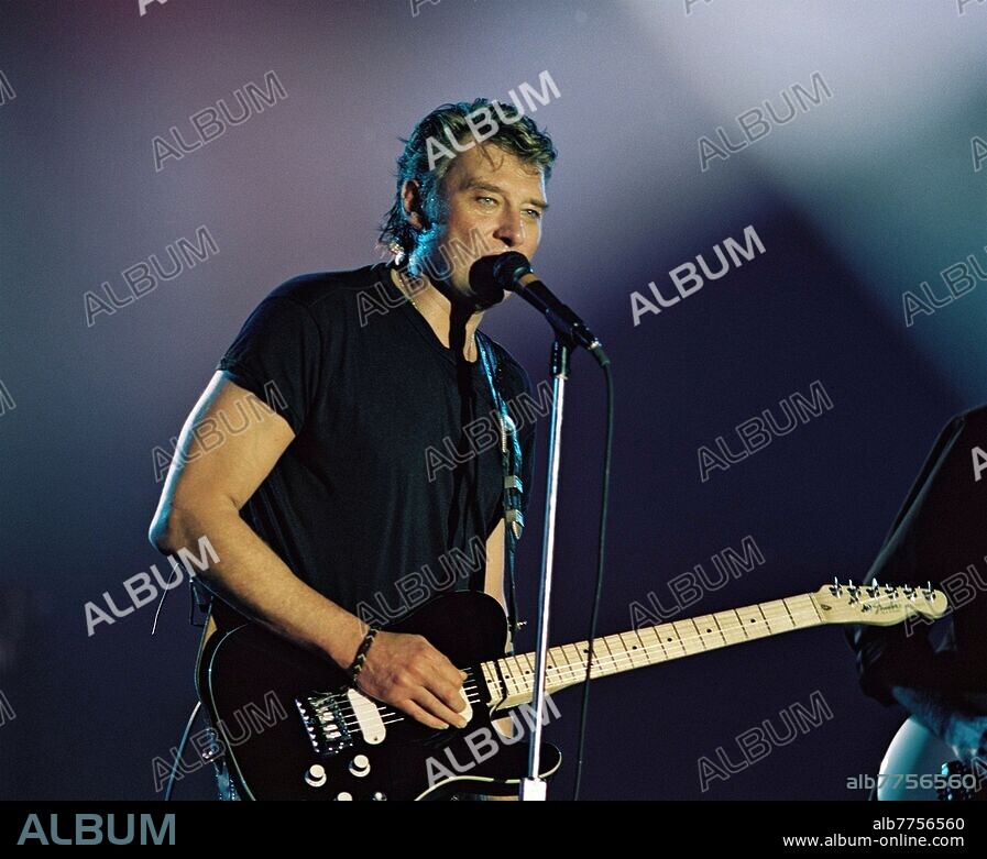 Johnny Hallyday (Jean-Philippe Smet)
Paris 15.6.1943 - Marnes-la-Coquette 6.12.2017.
Johnny Hallyday sur scène, en concert au Palais omnisports de Paris-Bercy.
Ce concert se déroule entre le 15 septembre et 4 octobre 1987.