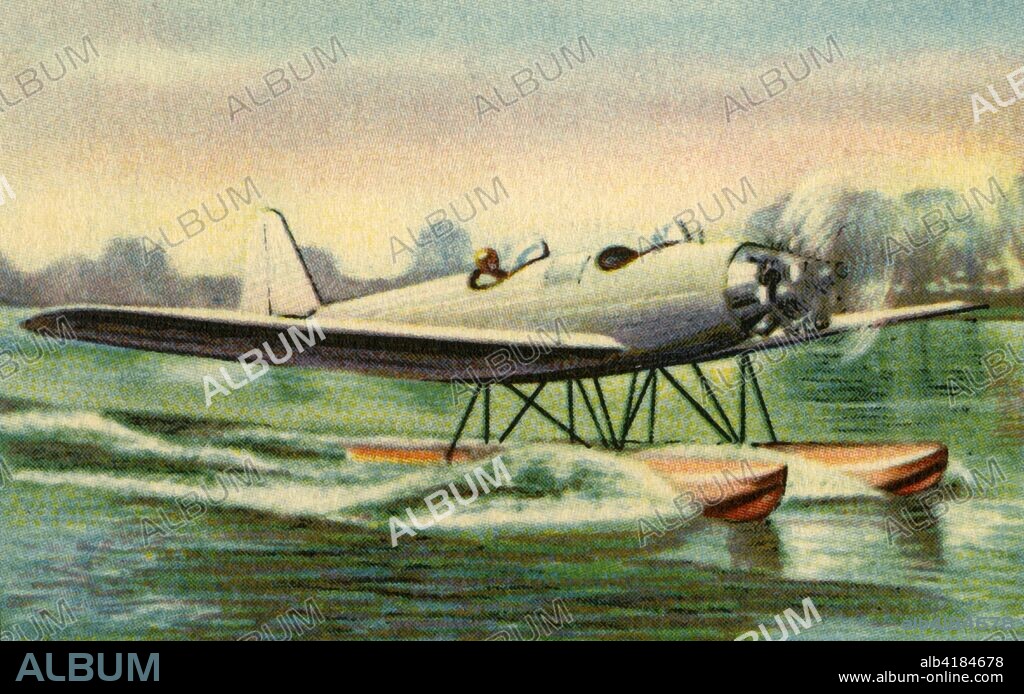 Junkers L 50 Junior seaplane, 1932. The Junkers A50 Junior was a German sports plane with an 80 horse power air-cooled Siemens engine. Seen here with  pontoons or floats fitted for use on water. From "Die Eroberung Der Luft", (The Conquest of the Air), cigarette card album produced by the Garbáty cigarette factory, 1932. Eugene and Moritz Garbáty, who were Jewish, were driven out of business by the Nazis in the late 1930s, and forced to sell their factory which lay empty for over 70 years. [Garbaty Cigarettenfabrik, Berlin-Pankow, 1932].