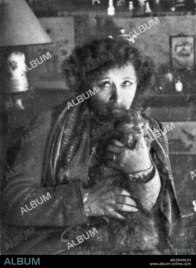 Collette, French novelist. Colette was the pen-name of Sidonie-Gabrielle Colette (1873-1954), who is best known for her novel Gigi (1944). A photograph from Album de Photographies, Dans L'Intimite de Personnages Illustres, 1850-1950, Editions MD, 22 Rue de L'Arcade, Paris 8, 1850-1950.