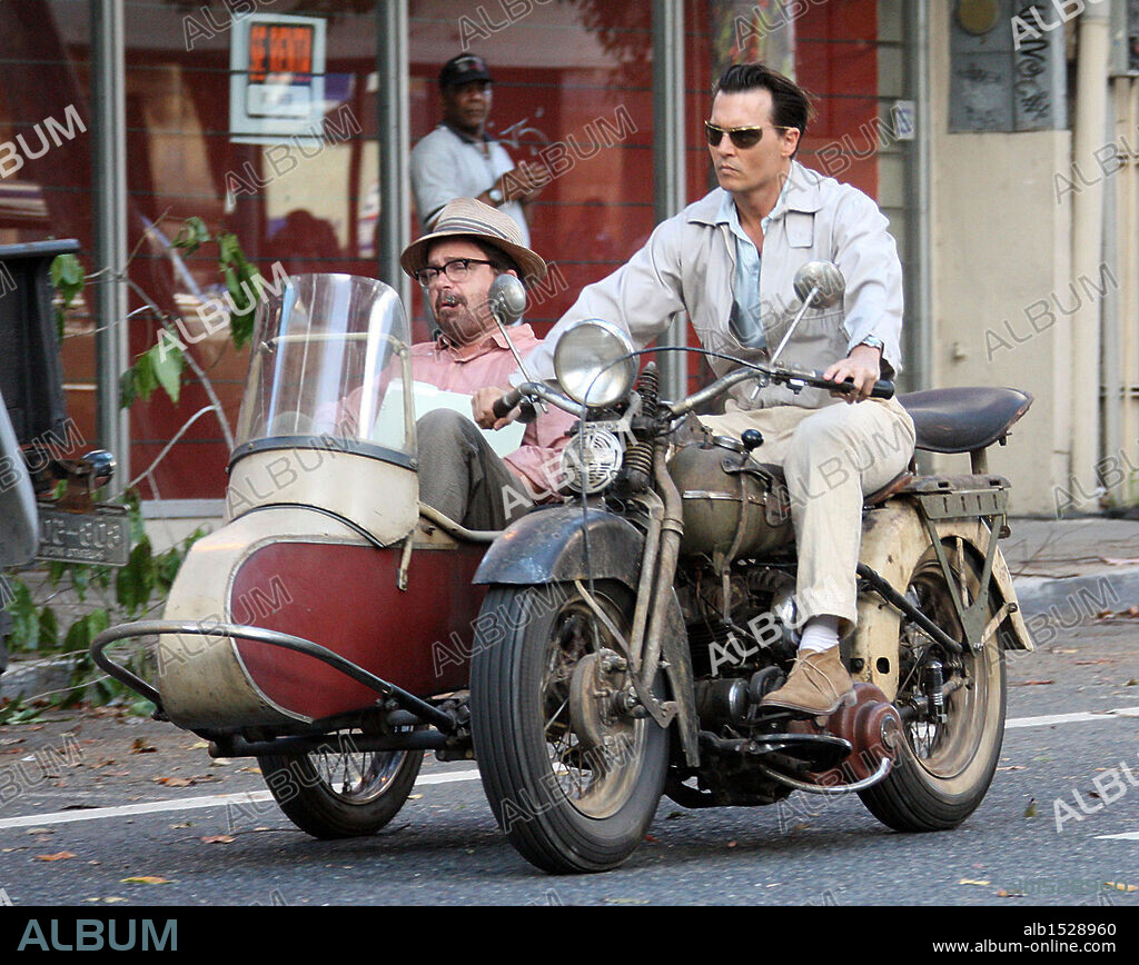 JOHNNY DEPP and MICHAEL RISPOLI in THE RUM DIARY, 2011, directed by BRUCE ROBINSON. Copyright DARK & STORMY ENTERTAINMENT.