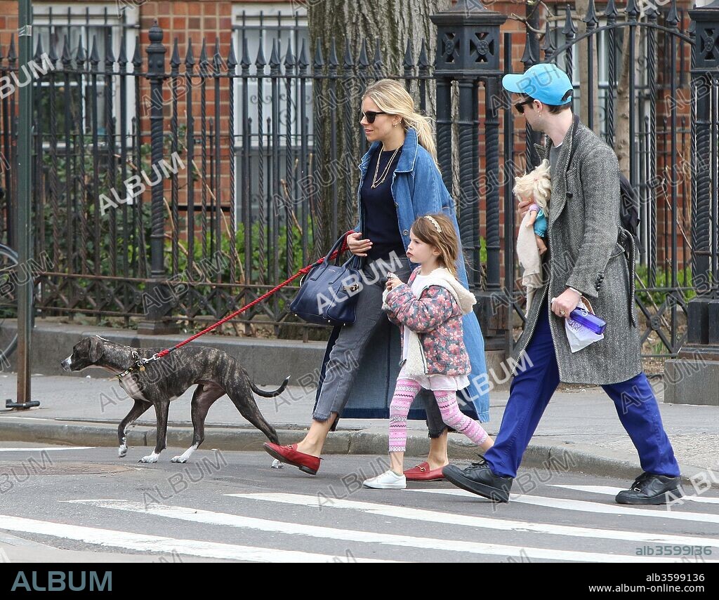 April 12, 2018 - New York, New York, United States - Actors Tom Sturridge and Sienna Miller take their daughter Marlowe Sturridge to a park in the West Village on April 12 2018 in New York City. 12/04/2018