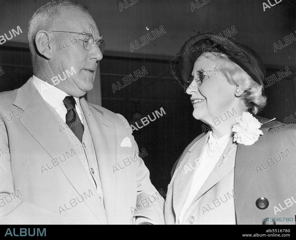 Q.E.A. Departures; Mascot: Mr. G. A. Lloyd and Mrs. Lloyd is the general manager for the Nuffield group in Australia and is travilling to England on business. May 27, 1951. (Photo by Peter Leyden).