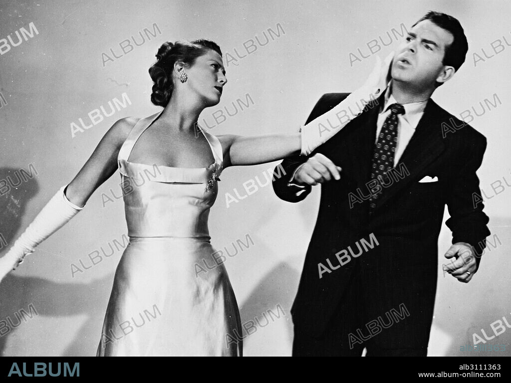 FRED MACMURRAY and MADELEINE CARROLL in AN INNOCENT AFFAIR, 1948, directed by LLOYD BACON. Copyright UNITED ARTISTS.