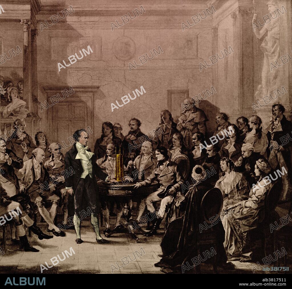 Volta revealing his electric battery to Napoleon Bonaparte (seated) and fellow scientists, in 1800. Upon presenting his invention, Napolean awarded Volta the medal of the Legion of Honor and made Volta a count. Alessandro Volta (February 18, 1745 - March 5, 1827) was an Italian physicist. He became interested in electricity in 1786 after seeing the work of Galvani. Volta was the first to show that an electrical current flowed when two dissimilar metals were brought into contact. In 1779 he became a professor of experimental physics at the University of Pavia, a chair that he occupied for almost 40 years. In 1800 he constructed a device which used this effect to produce a large flow of electricity. Bowls of salt solution were connected together by metal strips, each composed of copper at one end and tin or zinc at the other, and a current was produced. A compact version of this, using a stack of discs of copper, zinc and cardboard moistened with salt solution, was shown to Napoleon in 1801. Upon presenting his invention, he was awarded the medal of the Legion of Honor and made a count. He died in 1827 just after his 82nd birthday. The unit of electrical potential, the volt (V), is named after him.