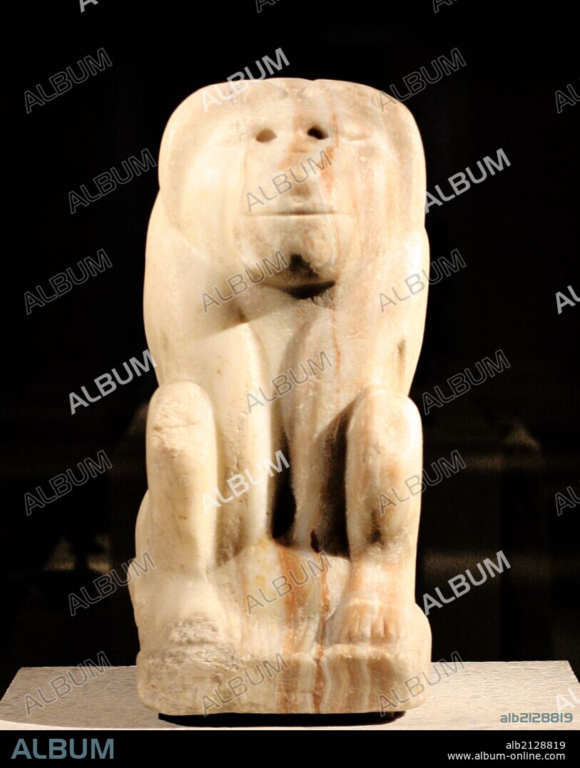 Seated figure of a baboon with the cartouche of king Narmer (Photo by: Universal History Archive/UIG via Getty Images).