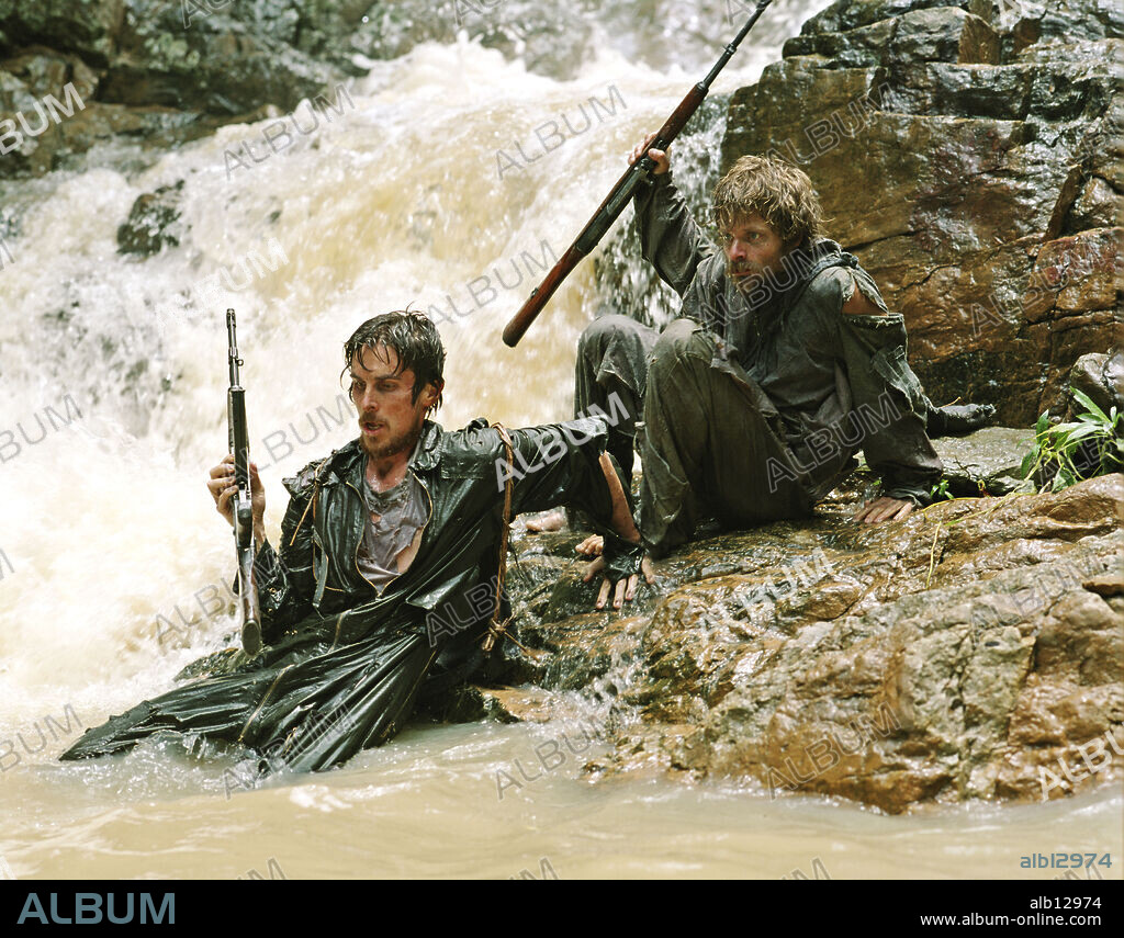 CHRISTIAN BALE and STEVE ZAHN in RESCUE DAWN, 2006, directed by WERNER HERZOG. Copyright METRO GOLDWYN.