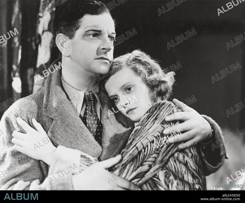 LESLIE BANKS and NOVA PILBEAM in THE MAN WHO KNEW TOO MUCH, 1934, directed by ALFRED HITCHCOCK. Copyright Gaumont British Production.