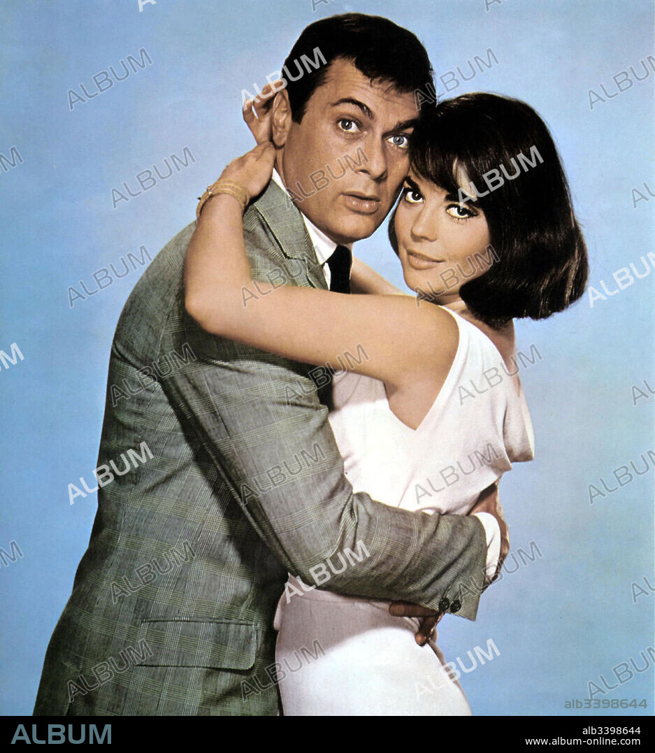 NATALIE WOOD y TONY CURTIS en LA PÍCARA SOLTERA, 1964 (SEX AND THE SINGLE GIRL), dirigida por RICHARD QUINE. Copyright WARNER BROTHERS.