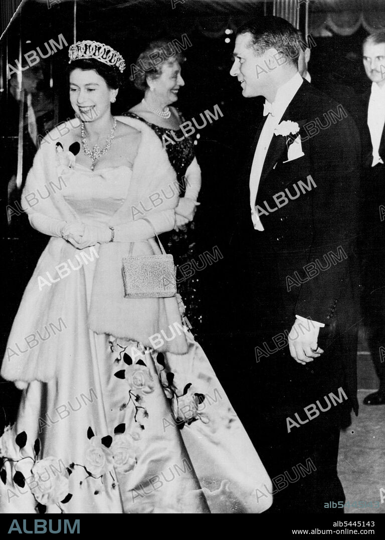 The Queen With Sir Laurence At The Premiere. The Queen 1955 with Sir Laurence Olivier, producer, director and star of 'Ricahrd III' which Her Majesty was arriving to see at the Leicester Square Theatre, London, on the film's premier this evening (Tuesday). This is Sir Laurence's third Shakespearean presentation for the screen, and the Queen was seeing it at her own request. December 13, 1955. (Photo by Reuterphoto).
