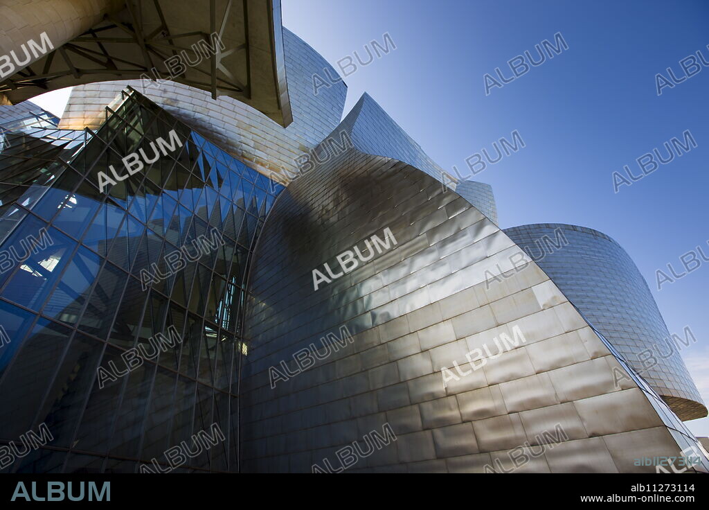 Architect Frank Gehry's Guggenheim Museum futuristic architectural design in titanium and glass at Bilbao, Basque country, Spain.