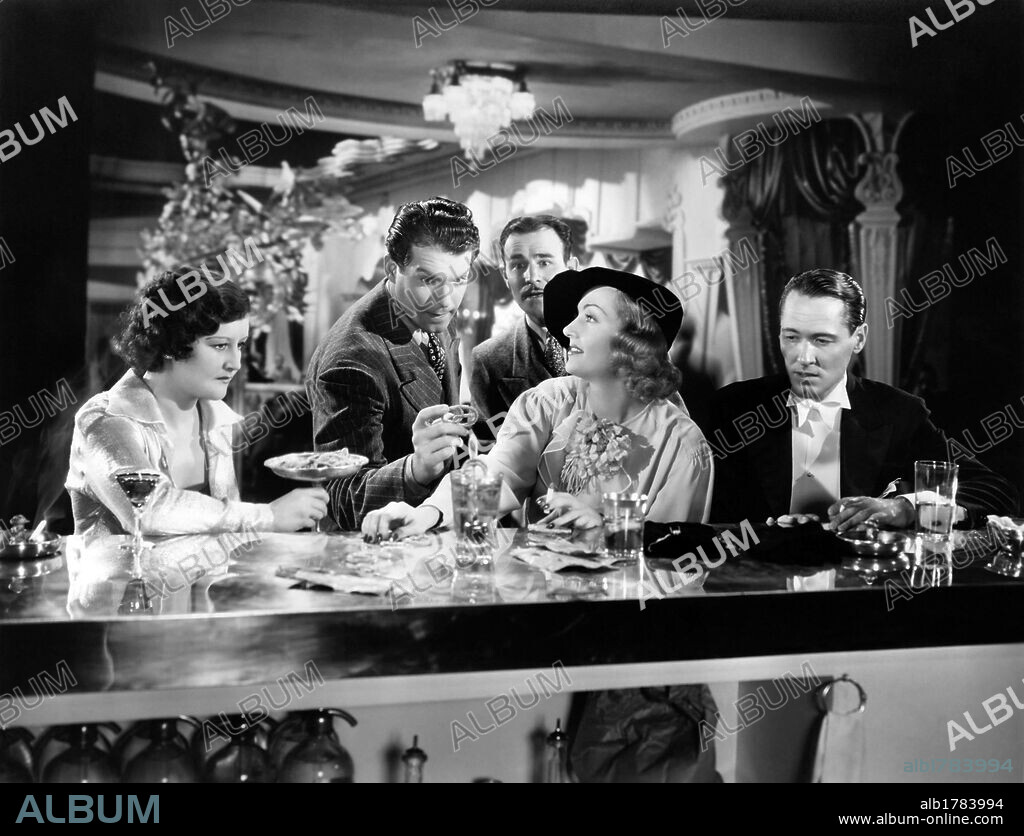 CAROLE LOMBARD and FRED MACMURRAY in HANDS ACROSS THE TABLE, 1935, directed by MITCHELL LEISEN. Copyright PARAMOUNT PICTURES.