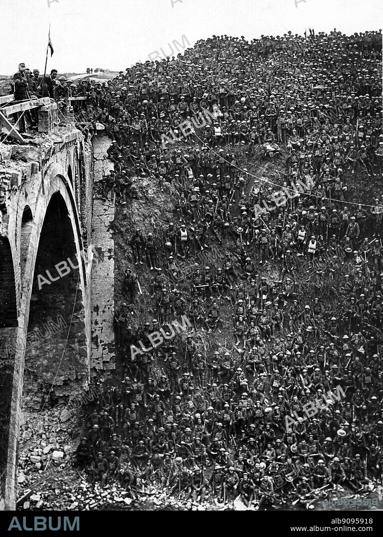 WW1: Battle of St Quentin Canal. Brigadier General J C Campbell on Riguemont Bridge addressing men of the 137th Regiment (Staffordshire), Brigade 46th Division on tanks of canal which crossed 29th September (2nd October 1918).