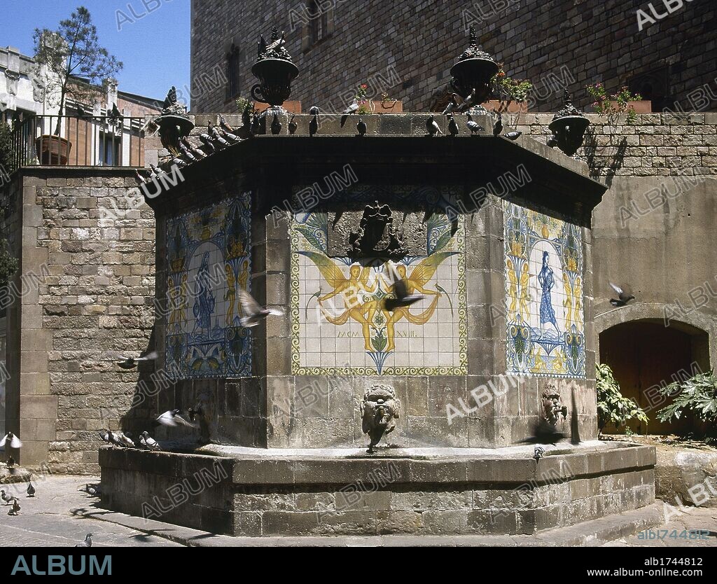 Fountain of the Puerta del Angel. Originally Gothic, was rebuilt in neoclassical style. In 1918 he added the ceramic murals by Josep Aragay. Barcelona. Catalonia. Spain.