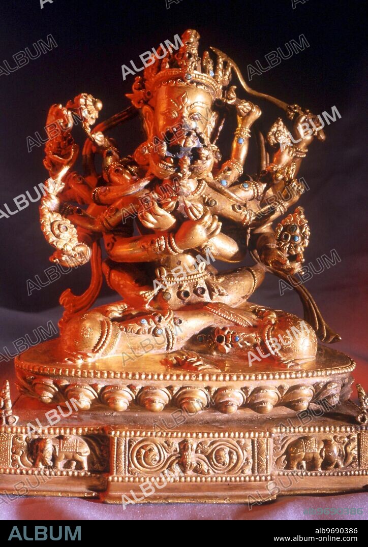 EROTIC ART - Tantric Buddhist deities in sexual congress - Yab-yum, with his consort. Seated on lotus throne, decorated with turquoise inlay. 17th or 18th century. private collection.