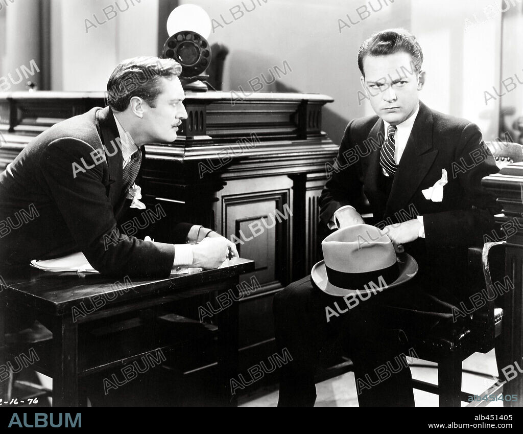 DONALD DILLAWAY and EDMUND LOWE in ATORNEY FOR THE DEFENSE, 1932, directed by IRVING CUMMINGS. Copyright COLUMBIA PICTURES.
