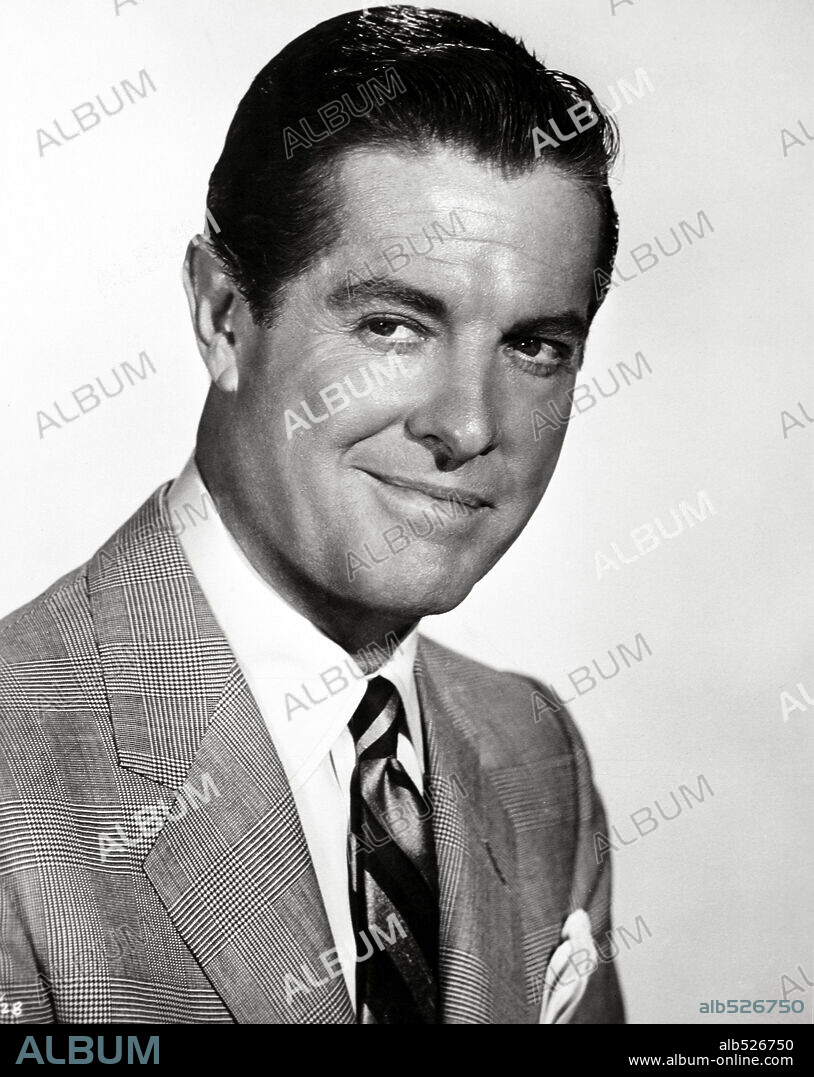 ROBERT CUMMINGS in THE CARPETBAGGERS, 1964, directed by EDWARD DMYTRYK. Copyright PARAMOUNT/EMBASSY.