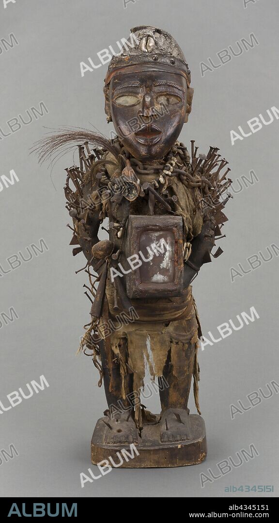 Male Figure (Nkisi Nkondi), Early/mid–19th century, Vili, Republic of the Congo, Central Africa, Wood, metal, glass, fabric, fiber, cowrie shells, bone, leather, gourd, and feathers, H. 72 cm (28 1/3 in.).