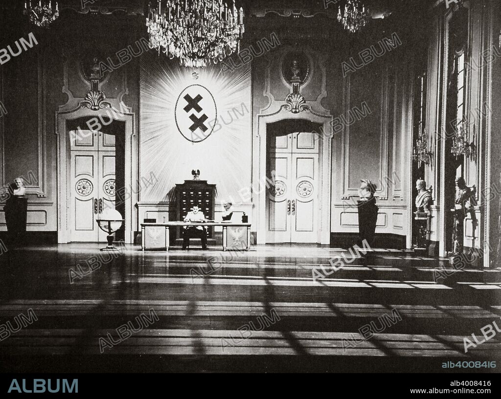 Charlie Chaplin portraying Adenoid Hynkel in the film 'The Great Dictator', 1940. The film was Chaplin's (1889-1977) first talking picture. As well as directing and producing the film, Chaplin played a dual role in it, one of his characters being Hynkel, a parody of Nazi leader Adolf Hitler. It was the only film of the period to satirise Hitler and Nazism. 'The Great Dictator' was nominated for five Oscars, but did not win any.