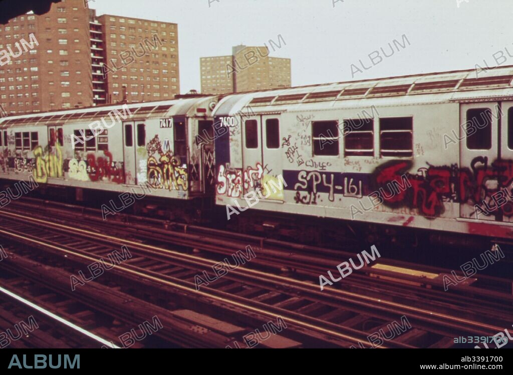 Subway car marked with extensive graffiti tags passes through a station, New York City, New York, May, 1973. Image courtesy National Archives.