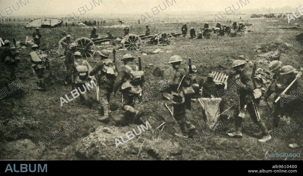 'A Corner of the Arras Battlefield', First World War, April 1917, (c1920). '...infantry filing towards the communication-trenches; artillery and a tank coming into action; cavalry (in the distance) advancing towards the retreating enemy', (the Germans). British troops on the front line in northern France. From "The Great World War: A History", Volume VII, edited by Frank A Mumby. [The Gresham Publishing Company Ltd, London, c1920].