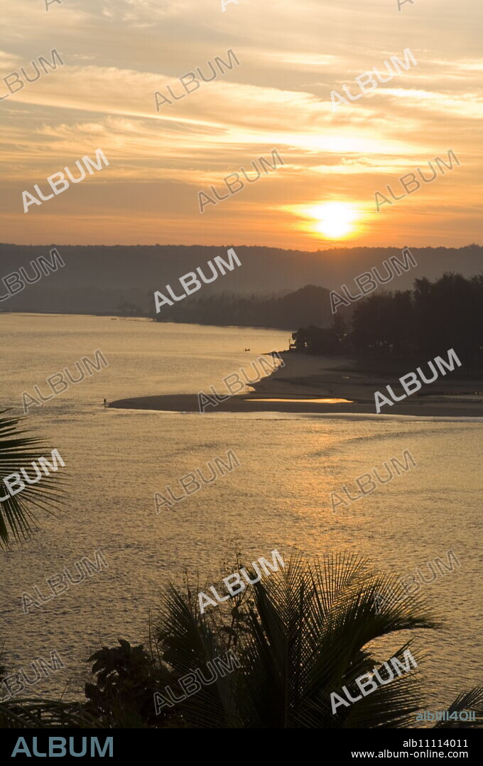 Sunset over the Tiracol River, Goa, India.