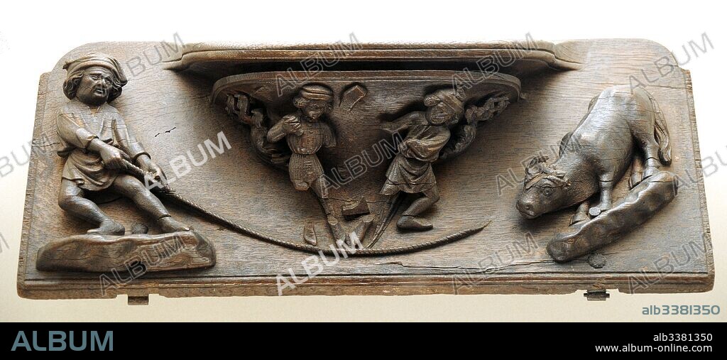 Pere Sanglada (documentado entre 1386-1408). Artista español. Misericordia con la representación de un hombre tirando de un buey, 1394-1399. Gótico. Talla en madera de roble. Procede de la sillería del coro de la Catedral de Barcelona. Museo Nacional de Arte de Cataluña. Barcelona. Cataluña. España.