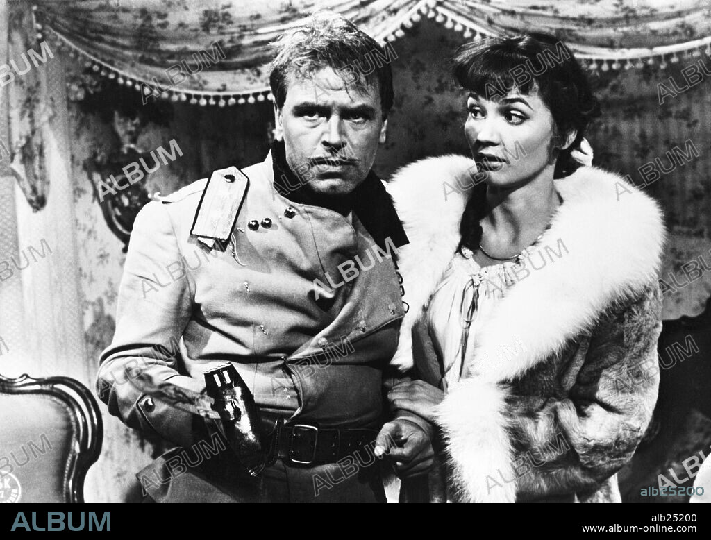 LISELOTTE PULVER and O. W. FISCHER in ARMS AND THE MAN, 1958 (HELDEN), directed by FRANZ PETER WIRTH. Copyright BAVARIA FILMKUNST.