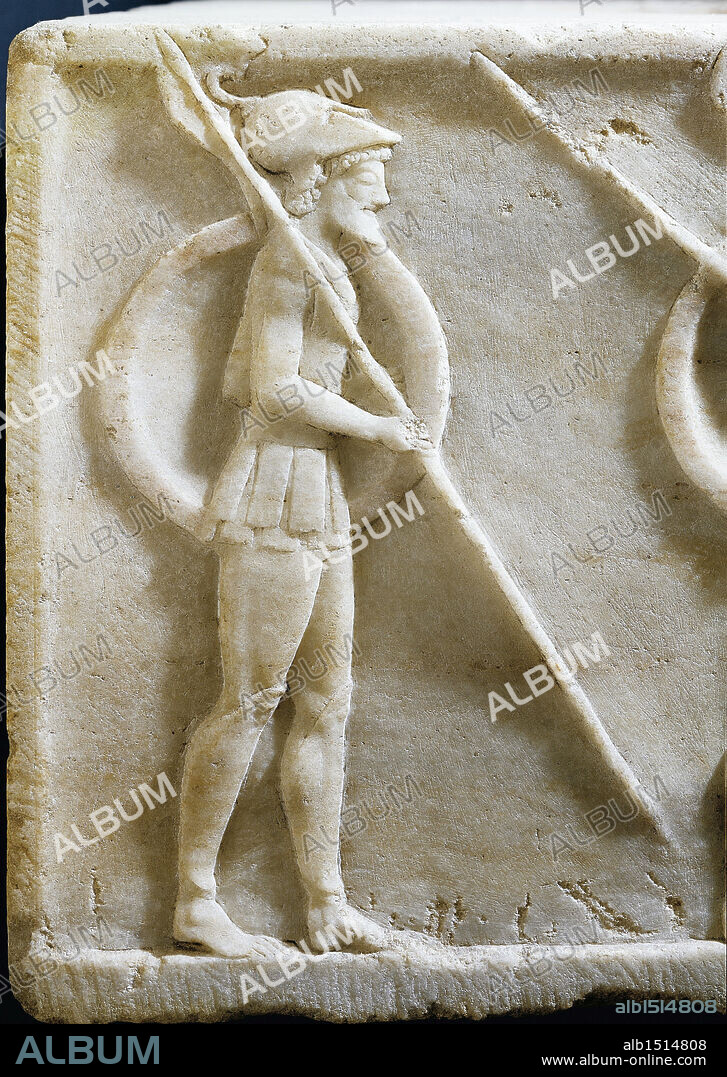 Greek civilization, 5th century b.C. Plinth of kouros statue depicting Hoplites and a horse-drawn chariot, circa 490 b.C. Detail: Hoplite holding a shield and a spear.