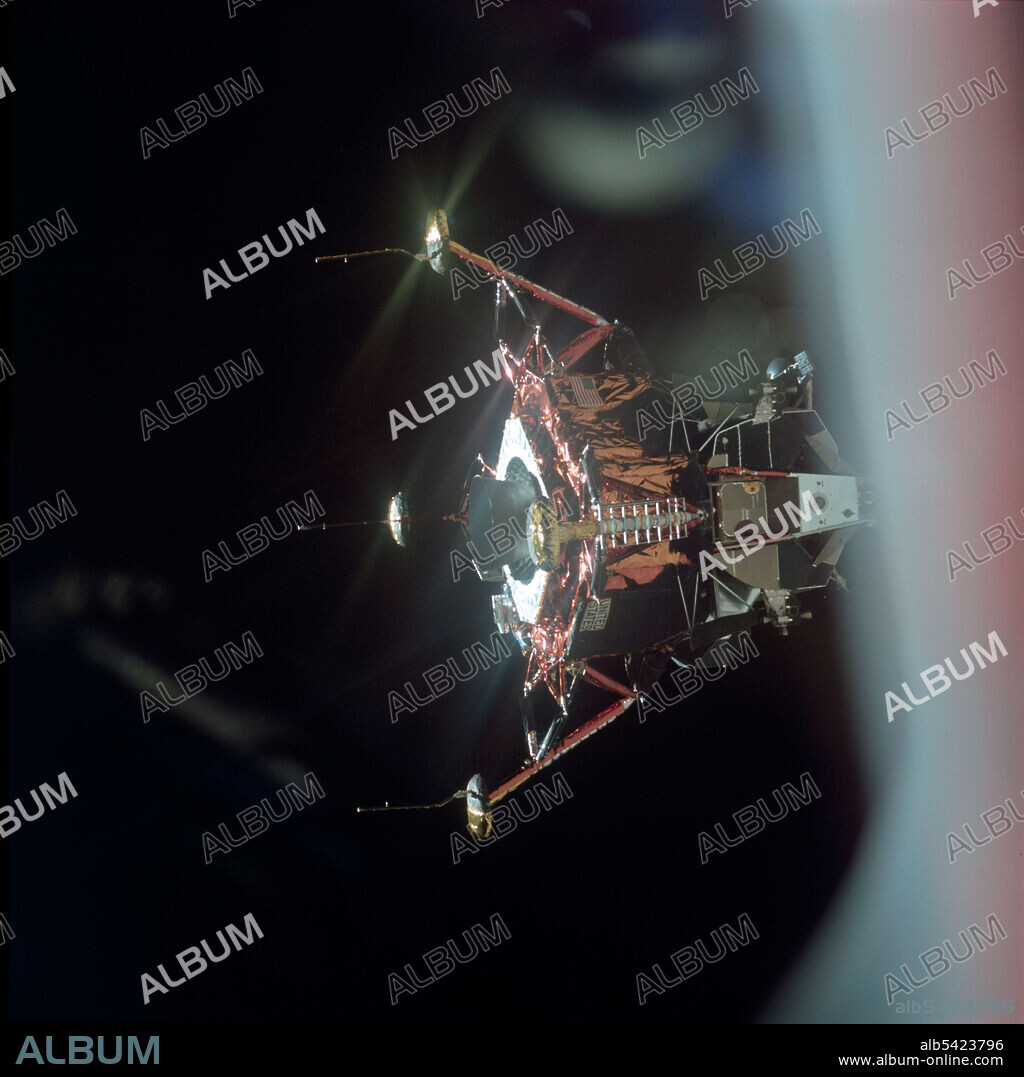 MICHAEL COLLINS. View of the Lunar Module from the Command Module, Apollo 11 mission, July 20, 1969. The Lunar Module (LM), code named Eagle, begins its descent to the lunar surface. Eagle, with US astronauts Neil Armstrong and Buzz Aldrin on board, landed in the Sea of Tranquillity. Apollo 11 was the fifth manned Apollo mission, and was the first to land on the Moon.