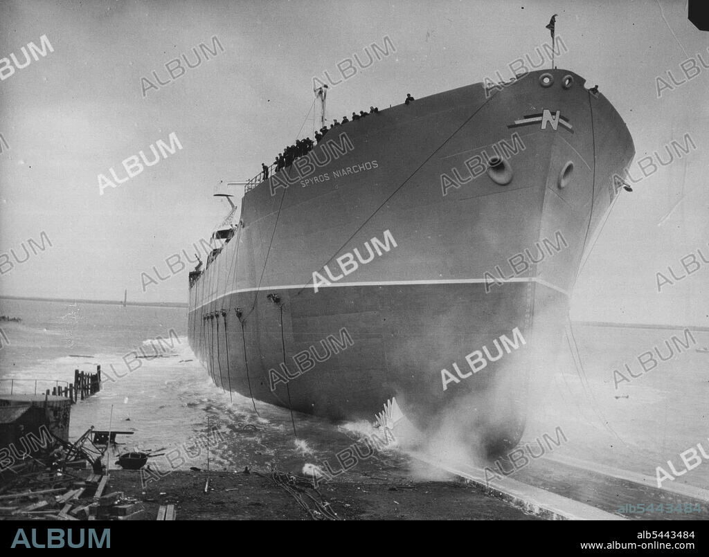 World's Largest Tanker Launched At Barrow-In-Furness - Spyrios Niarchos entering the water during the launching at Barrow-in-Furness, today December 2. The world's biggest oil tanker, the 47,750-ton Spyrios Niarchos, was launched at Barrow-In-Furness, today December 2. Vickers Armstrong built the tanker for Greek shipping magnate Stavros Niarchos, who attended the launching. Flying the Greek flag, the ship will carry crude oil from the Persian Gulf to refineries in the United Kingdom. The new tanker is 757 feet long, and turbines of 20,000 horsepower will drive it at a maximum speed of 17 knots. December 2, 1955. (Photo by Associated Press Photo).
