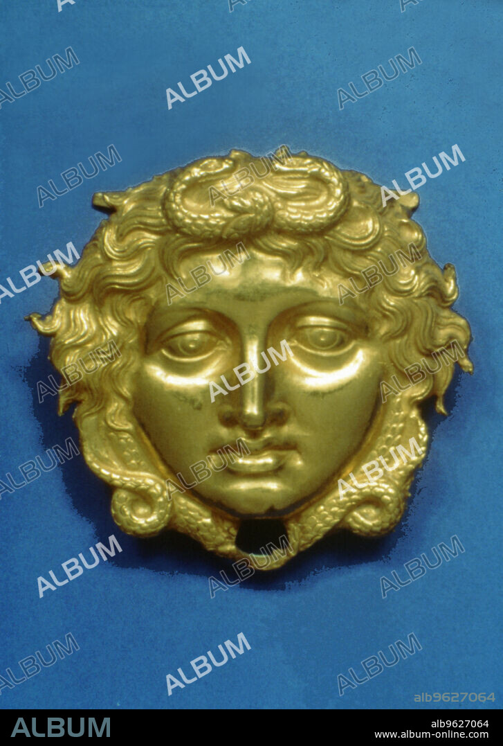 Head of the Gorgon Medusa in embossing gold, piece from the royal tomb at Vergina (350 BC).