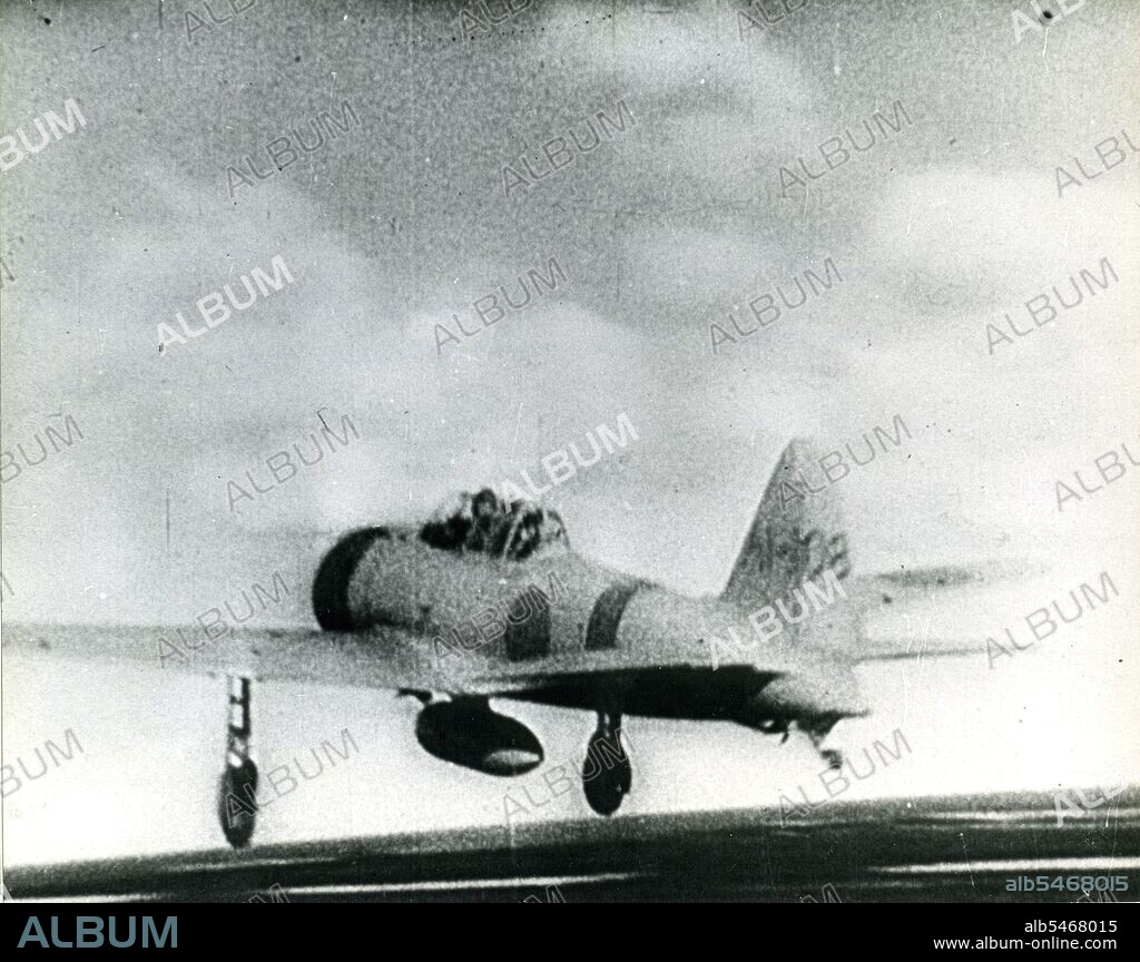 A Japanese Navy 'Zero' fighter (tail-code A1-108) takes off from the aircraft carrier AKAGI, on its way to attack Pearl Harbor during the morning of 7 December 1941.