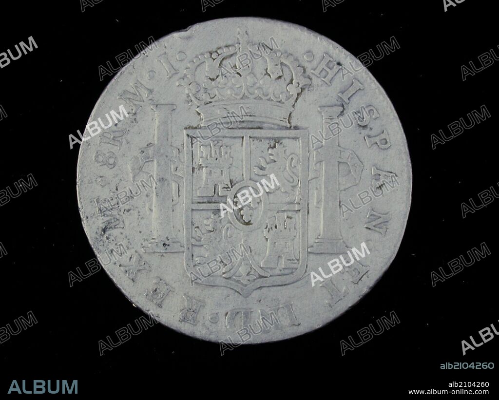 NUMISMATICA. MONEDA MODERNA. OCHO REALES DE PLATA, DE CARLOS III. REVERSO. ARMAS DE CASTILLA Y LEON, Y BORBON, DENTRO DE UN ESCUDO CORONADO EN MEDIO DE DOS COLUMNAS.1784. (DEPOSITO: MUSEO ARQUEOLOGICO NACIONAL).