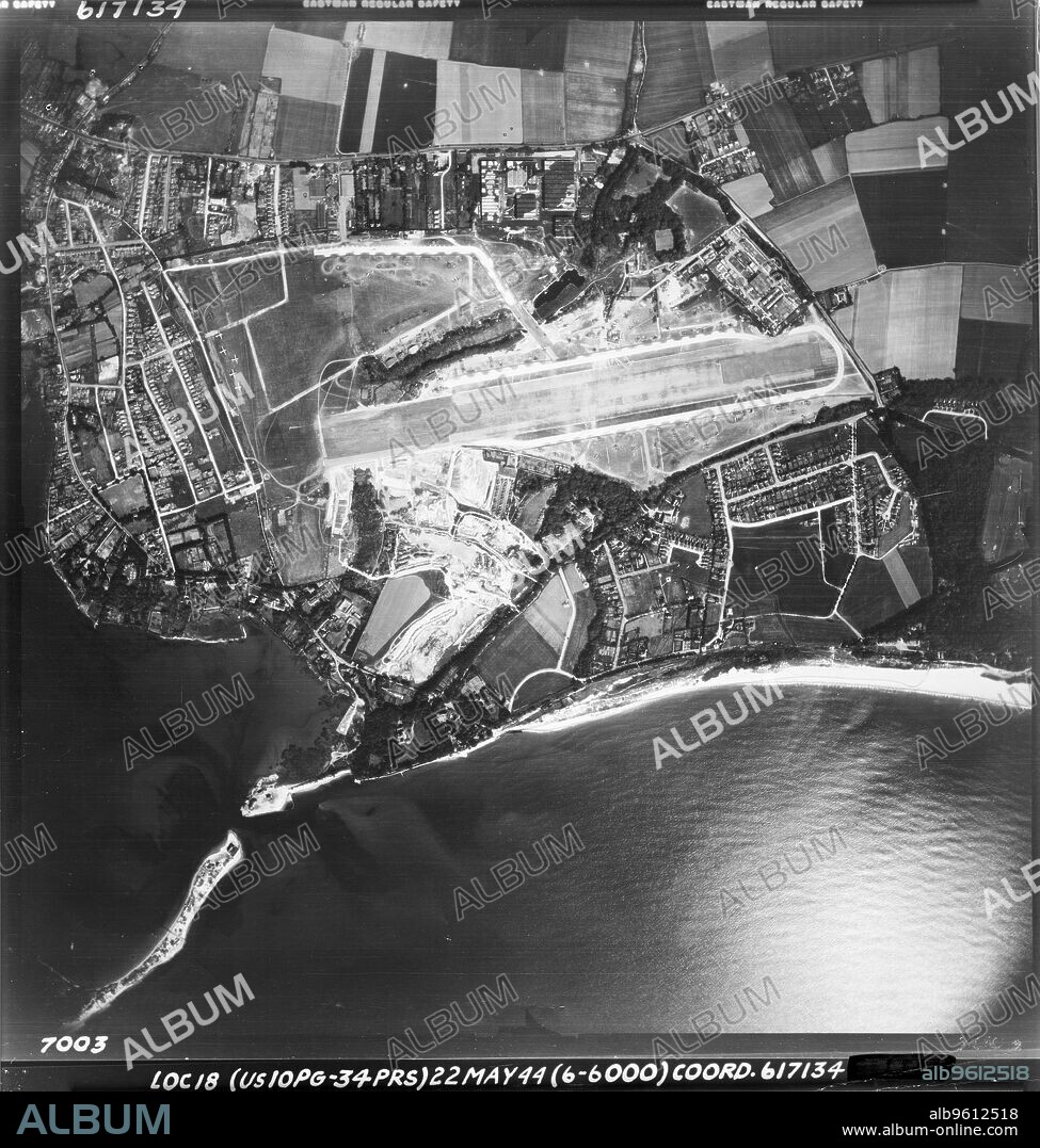 USAAF PHOTOGRAPHER. RAF Christchurch, Dorset, May 1944. The pre-War airfield was requisitioned by the RAF and used for testing and aircraft production. It was used by the USAAF from 1943 in preparation for D-Day.