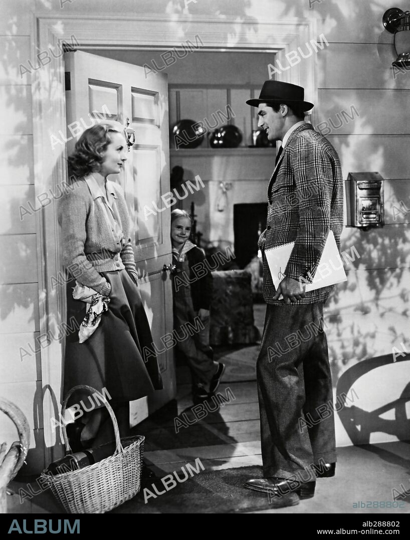 CAROLE LOMBARD, CARY GRANT and PEGGY ANN GARNER in IN NAME ONLY, 1939, directed by JOHN CROMWELL. Copyright RKO.
