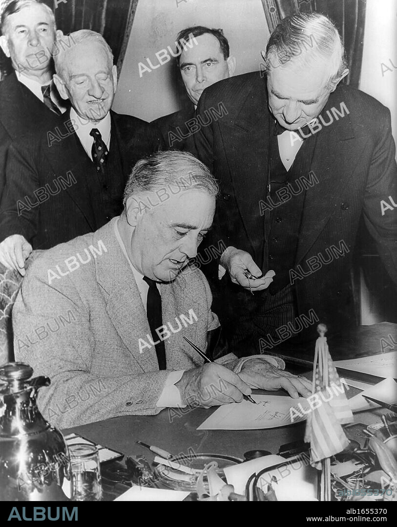 Franklin Delano Roosevelt (1882-1945) 32nd President of the United States of America 1933-1945, signing the declaration of war against Japan, 8 December 1941. Second World War.