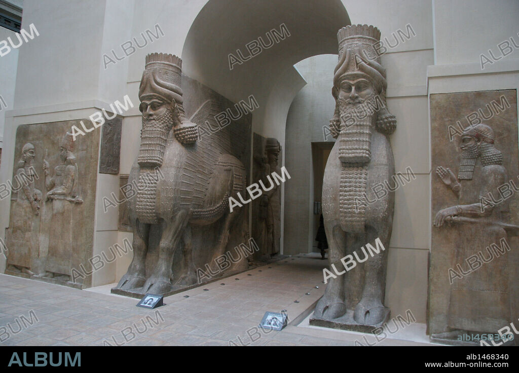 Assyrian Art. "Lamasu" or Bull-man.  Gate from Sargon II's Palace. Dur-Sharrukin (Khorsabad). Assyria, 721-705 BC. Alabaster. 8th century BC. Louvre Museum. Paris. France.