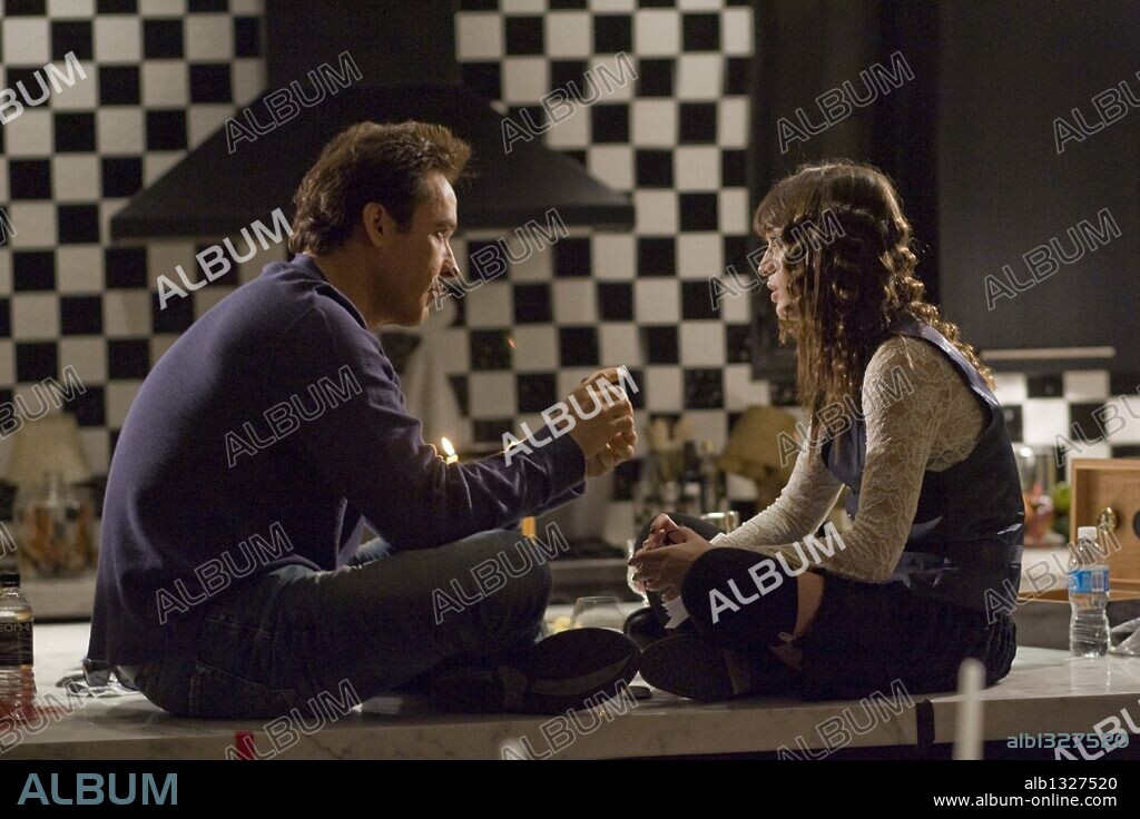 JOHN CUSACK and LIZZY CAPLAN in HOT TUB TIME MACHINE, 2010, directed by STEVE PINK. Copyright MGM/NEW CRIME PRODUCTIONS/UNITED ARTISTS.