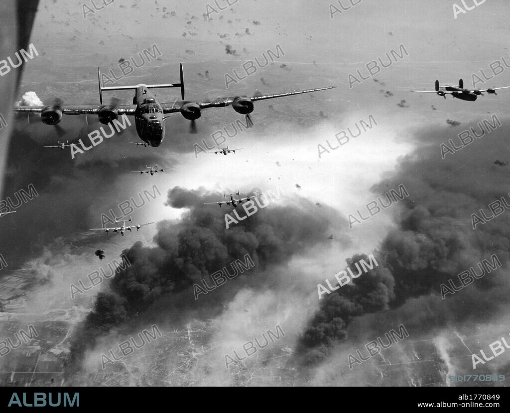 Bomber Liberator B-24 in action. Liberator B-24 bombers of the Allied 15th Air Force in action to shoot an oil refinery among the shots of the air defence. Ploiesti, August 1944.
