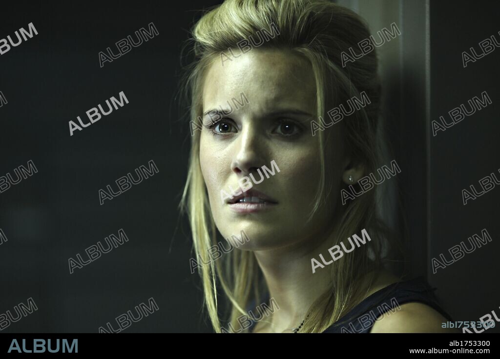 MAGGIE GRACE en MS1: MAXIMA SEGURIDAD, 2012 (LOCKOUT), dirigida por JAMES MATHER y STEPHEN ST. LEGER. Copyright EUROPA CORP.