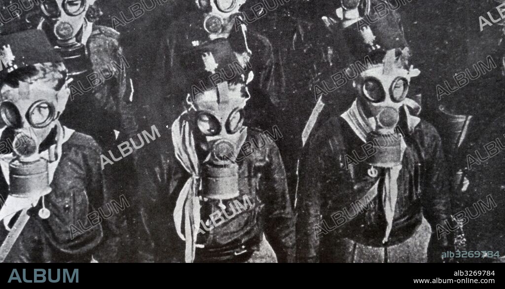 Photograph of Italian Fascist Youths of the Balillas wearing gas masks. Dated 20th Century.