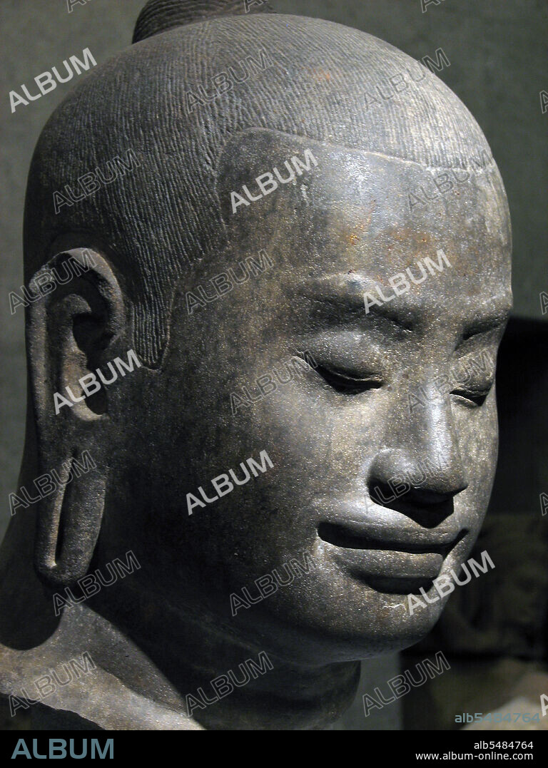 Jayavarman VII (1125–1215) was a king (reigned c.1181-1215) of the Khmer Empireat Angkor. Cambodia. He was the son of King Dharanindravarman II (r. 1150-1160) and Queen Sri Jayarajacudamani. He married Jayarajadevi and then, after her death, married her sister Indradevi. The two women are commonly thought to have been a great inspiration to him, particularly in his unusual devotion to Buddhism, as only one prior Khmer king had been a Buddhist. Over the 30 some years of his reign, Jayavarman embarked on a grand program of construction that included both public works and monuments. As a Mahayana Buddhist, his declared aim was to alleviate the suffering of his people. One inscription tells us, 'He suffered from the illnesses of his subjects more than from his own; the pain that affected men's bodies was for him a spiritual pain, and thus more piercing'. This declaration must be read in light of the undeniable fact that the numerous monuments erected by Jayavarman must have required the labor of thousands of workers, and that Jayavarman's reign was marked by the centralization of the state and the herding of people into ever greater population centers. Historians have identified three stages in Jayavarman's building program. In the first stage, he focussed on useful constructions, such as hospitals, rest houses along the roads, and reservoirs. Thereafter, he built a pair of temples in honor of his parents: Ta Prohm in honor of his mother and Preah Khan in honor of his father. Finally, he constructed his own 'temple-mountain' at Bayon and developed the city of Angkor Thom around it. He also built Neak Pean ('Coiled Serpent'), one of the smallest but most beautiful temples in the Angkor complex, a fountain with four surrounding ponds set on an island in that artificial lake.