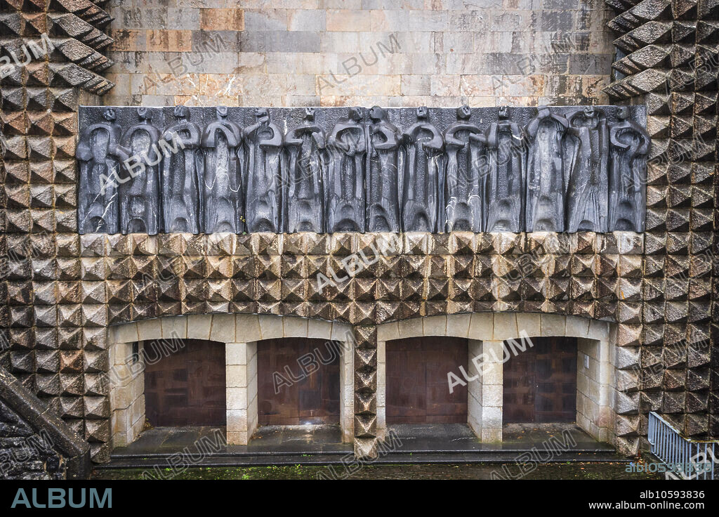 sculptures of the 14 apostles on the façade, sculptor Jorge Oteiza, and iron doors by Eduardo Chillida, Arantzazu Sanctuary, municipality of Oñati, , Basque Country, Spain.