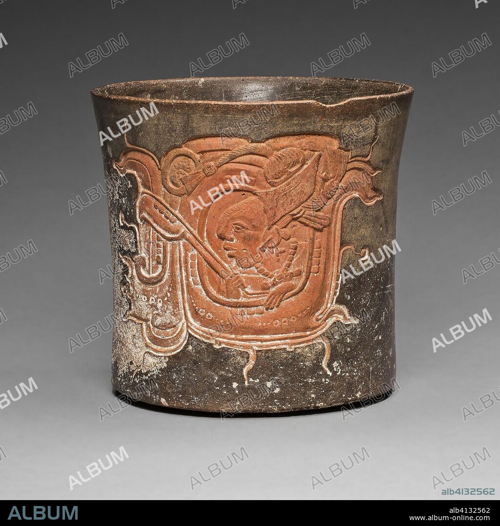 Carved Vessel Depicting a Lord Wearing a Water-Lily Headdress. Late Classic Maya, Chocholá; Yucatán or Campeche, Mexico. Date: 600 AD-800 AD. Dimensions: H. 15.2 cm (6 in.). Ceramic and pigment. Origin: Mexico.
