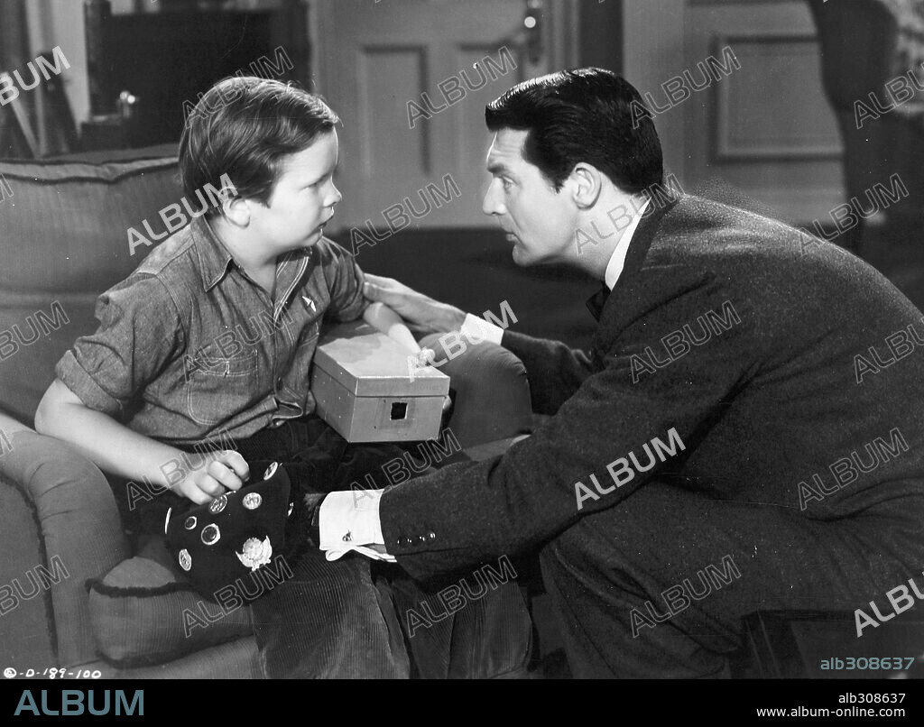 CARY GRANT and TED DONALDSON in ONCE UPON A TIME, 1944, directed by ALEXANDER HALL. Copyright COLUMBIA PICTURES.
