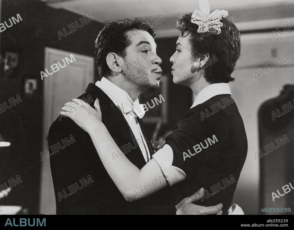 BEATRIZ SAAVEDRA and CANTINFLAS in DROP THE CURTAIN, 1955 (ABAJO EL TELÓN), directed by MIGUEL M. DELGADO. Copyright POSA FILMS, S.A.