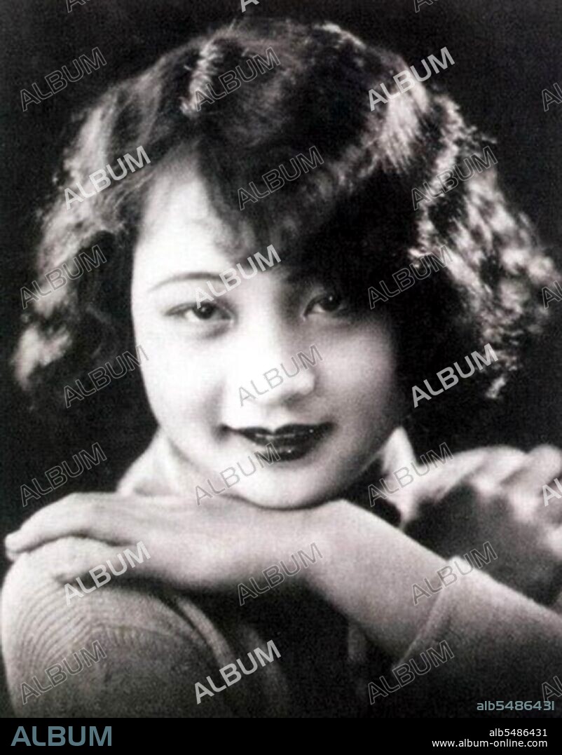 Li was born Qian Zhenzhen in Beijing, 1915. Her father, Qian Zhuangfei, was an important figure among the early heroes of the Communist Party. In 1927 she moved to Shanghai, where her father encouraged her to join the China National Song & Dance Troupe, later renamed Bright Moon Song and Dance Troupe. Li Jinhui, later known as the Father of Chinese popular music, was the conductor of the troupe and adopted her as his god-daughter, and she adopted his surname. The troupe were very popular in 1920s Shanghai. Li Lili, Wang Renmei, Xue Lingxian and Hu Jia were known as the Four Divas. The troupe joined the Lianhua Film Company in 1931, and disbanded the troupe the next year. Li became an actress, and starred in Sun Yu's 1932 Loving Blood of the Volcano. Set in the South Seas with plenty of dancing, this allowed Li to play to her strengths. She and Wang Renmei then acted together in Poetry Written on the Banana Leaf. After war with Japan broke out in 1937, she joined the China Film Studio in Chongqing. There she met and married Luo Jingyu, a section head, who became head of the studio. In 1939 she filmed Cai Chusheng's Orphan Island Paradise in Hong Kong; it was another hit. Back in Chongqing, she starred in another hit film Storm on the Border, for which she was highly praised. Li travelled to the United States in 1946, studying acting at Catholic University in Washington, language and singing in New York, and make-up at the University of California. She also observed filmmaking at Hollywood. She returned to China, and to acting at the Beijing Film Studio. In 1955, she studied at Beijing Film Academy, and later taught in the acting department. Her son, Luo Dan, married the daughter of Marshal Ye Jianying; Ye became China's head of state in the late 1970s. During the Cultural Revolution, Li and her husband were denounced and tortured on the orders of Mao's wife Jiang Qing. Li had acted with her, and outshone her, in films such as Blood on Wolf Mountain. Li later told her family that she refused to denounce anyone. Luo, however, was killed. In 1991, she was given the 'Special Honour Award' by the Chinese Academy of Motion Picture Arts. By the end of her life, Li Lili was the last living Chinese movie star from the silent era. She died of a heart attack in Xuanwu Hospital, Beijing on August 7, 2005, aged 90.