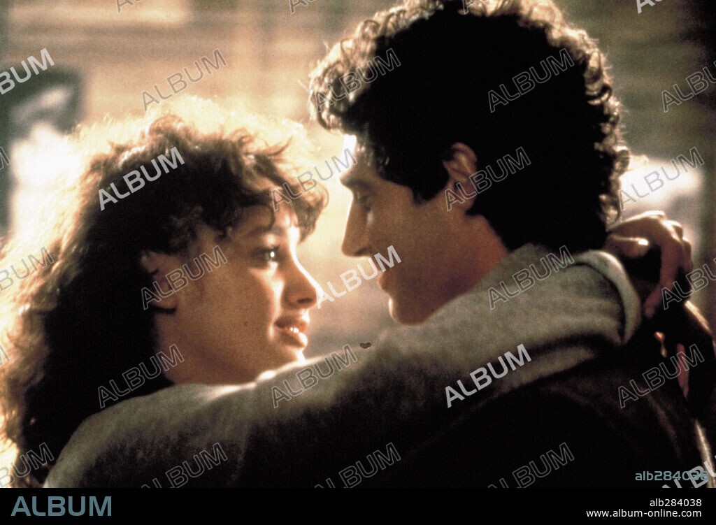JENNIFER BEALS and MICHAEL NOURI in FLASHDANCE, 1983, directed by ADRIAN LYNE. Copyright PARAMOUNT PICTURES.