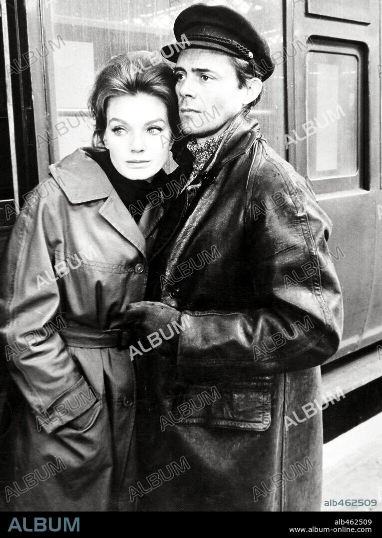 DIRK BOGARDE and MARIA PERSCHY in THE PASSWORD IS COURAGE, 1962. Copyright M.G.M.
