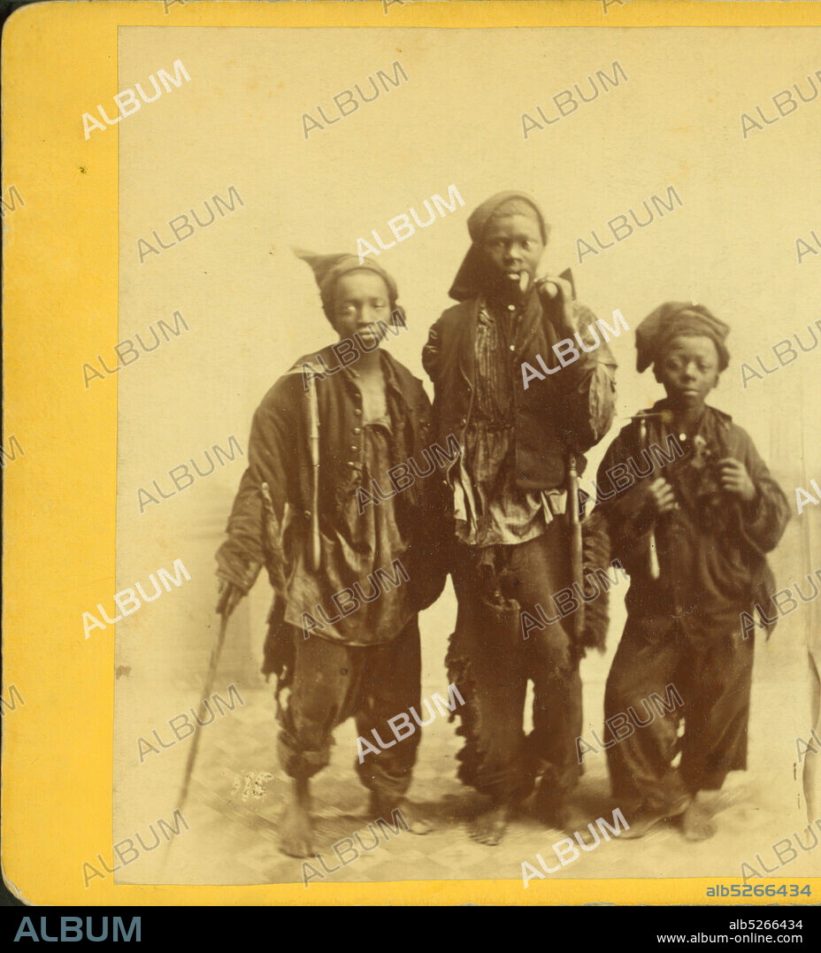 Fellow Citizens. Studio portrait of three young chimney sweeps., Ryan, D. J. (1837-), 1868.